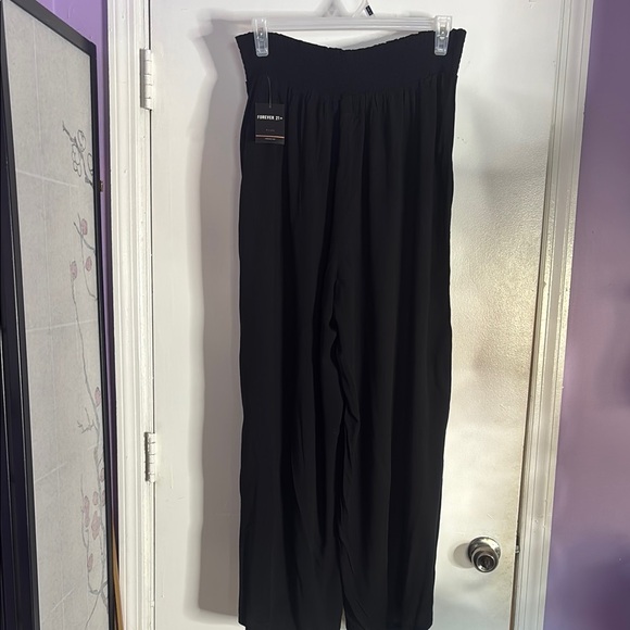Black Women's Wide-Leg Pants - Picture 9 of 11